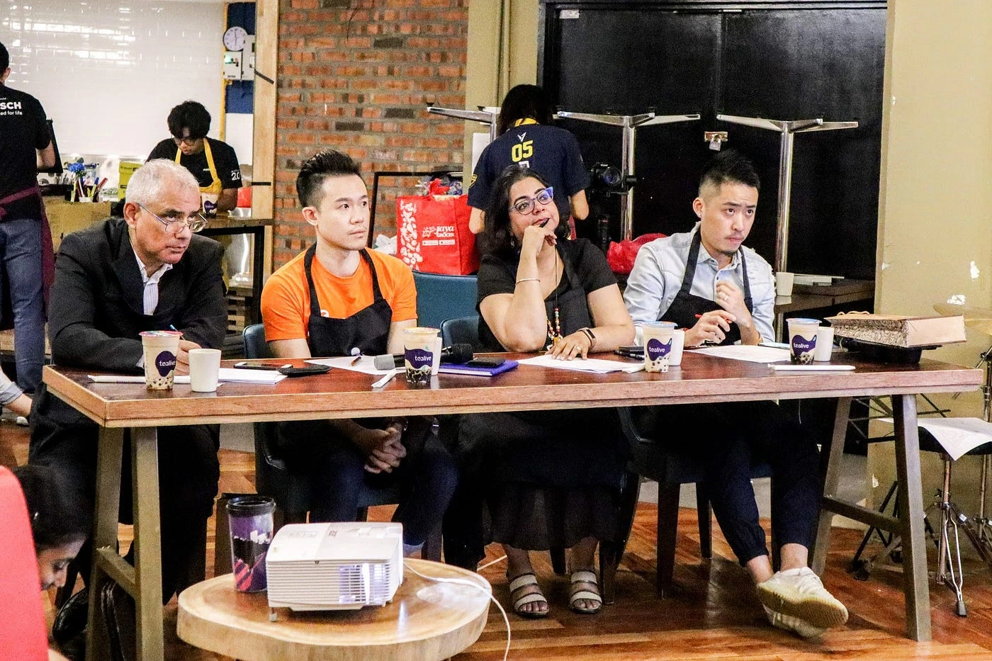 The judges take their seats.