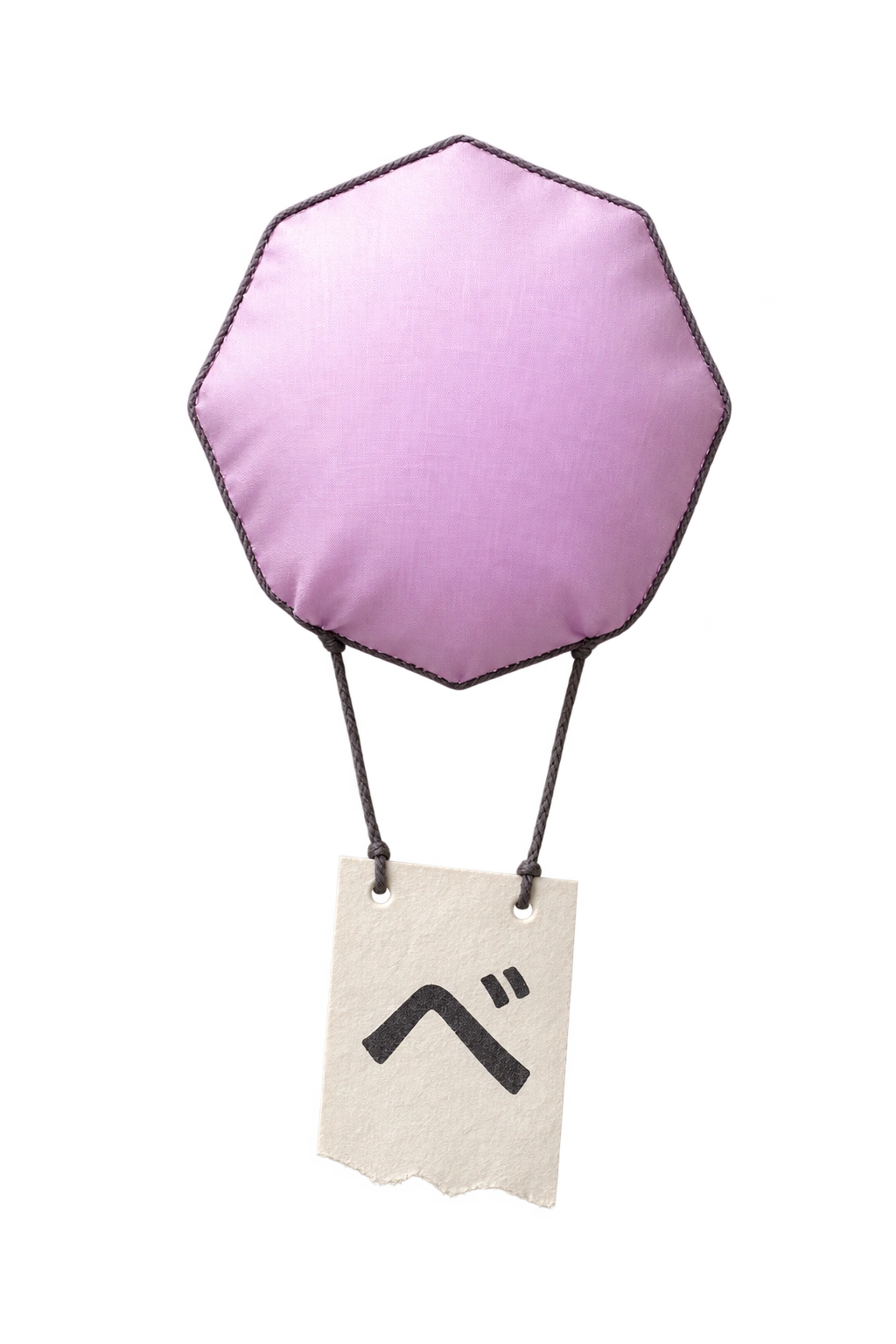 The original lilac NihongoUp balloon design as a cloth object, carrying a paper kana ticket