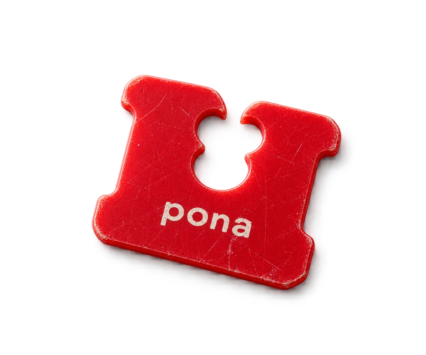 A red Pona bread-bag clip
