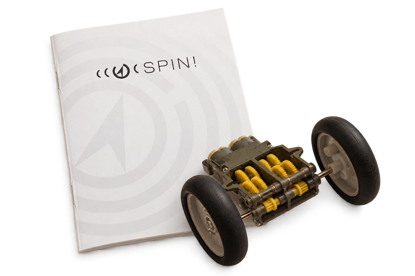 The SPIN report booklet and the project’s two-wheel gearbox assembly