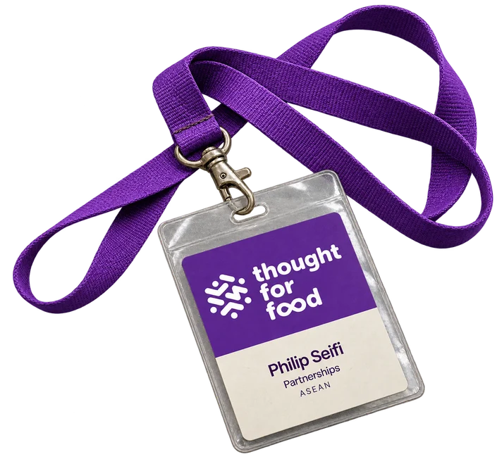 A purple Thought For Food lanyard with the official logo